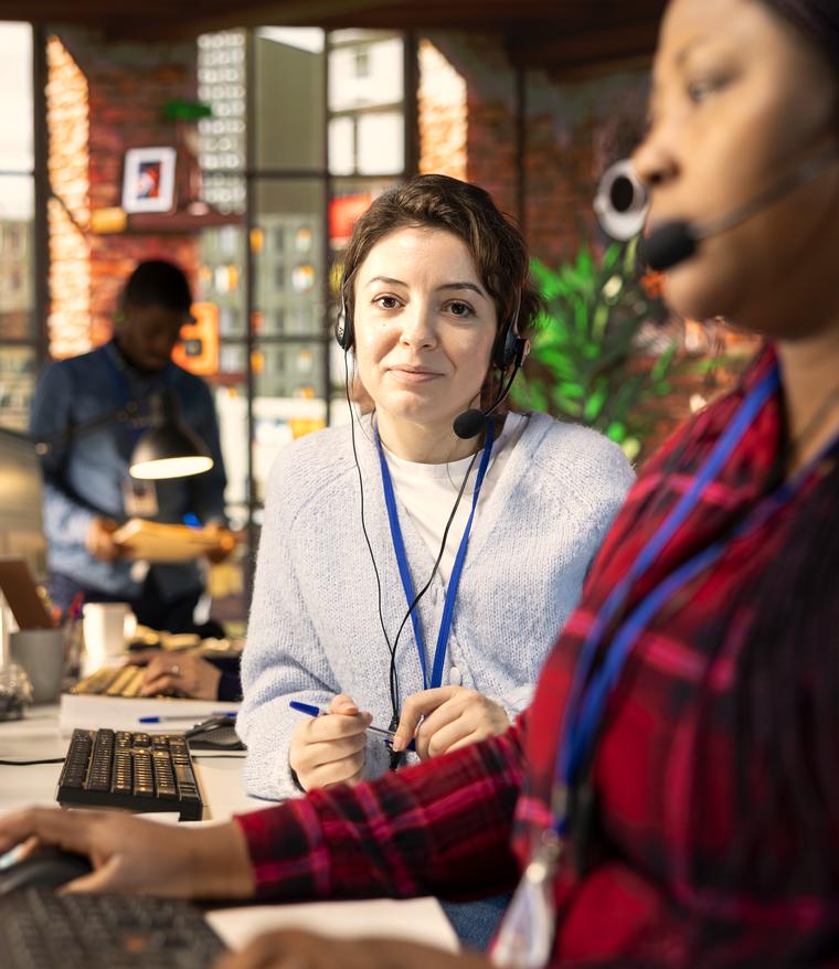 Brandbuddiez customer team working enquiries on headsets